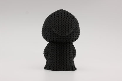 3D-printet figur av Grim reaper i strikket design som holder et hjerte